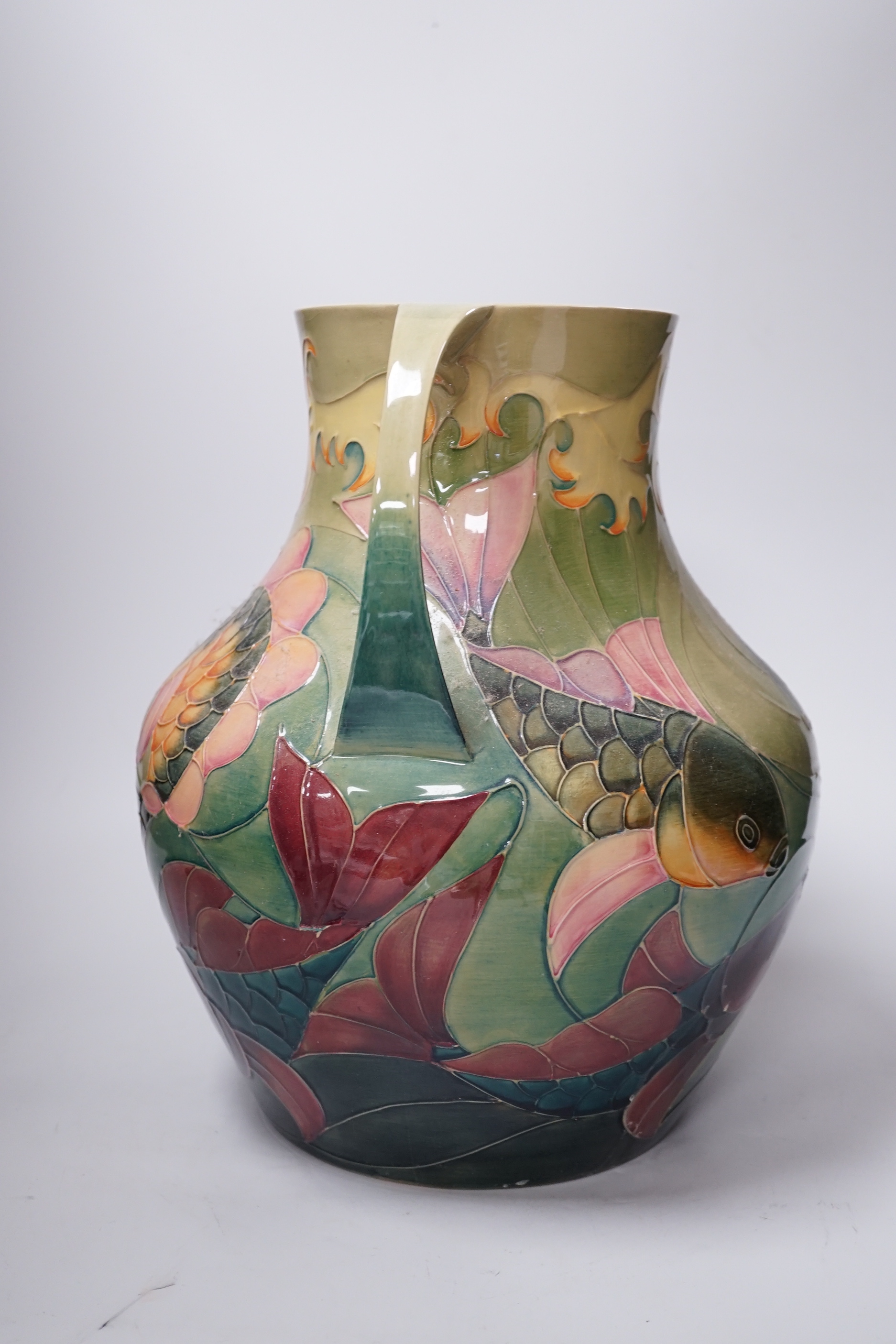 Large Moorcroft ‘Carp’ vase with twin handles designed by Sally Tuffin decorated with carp, 33cm high